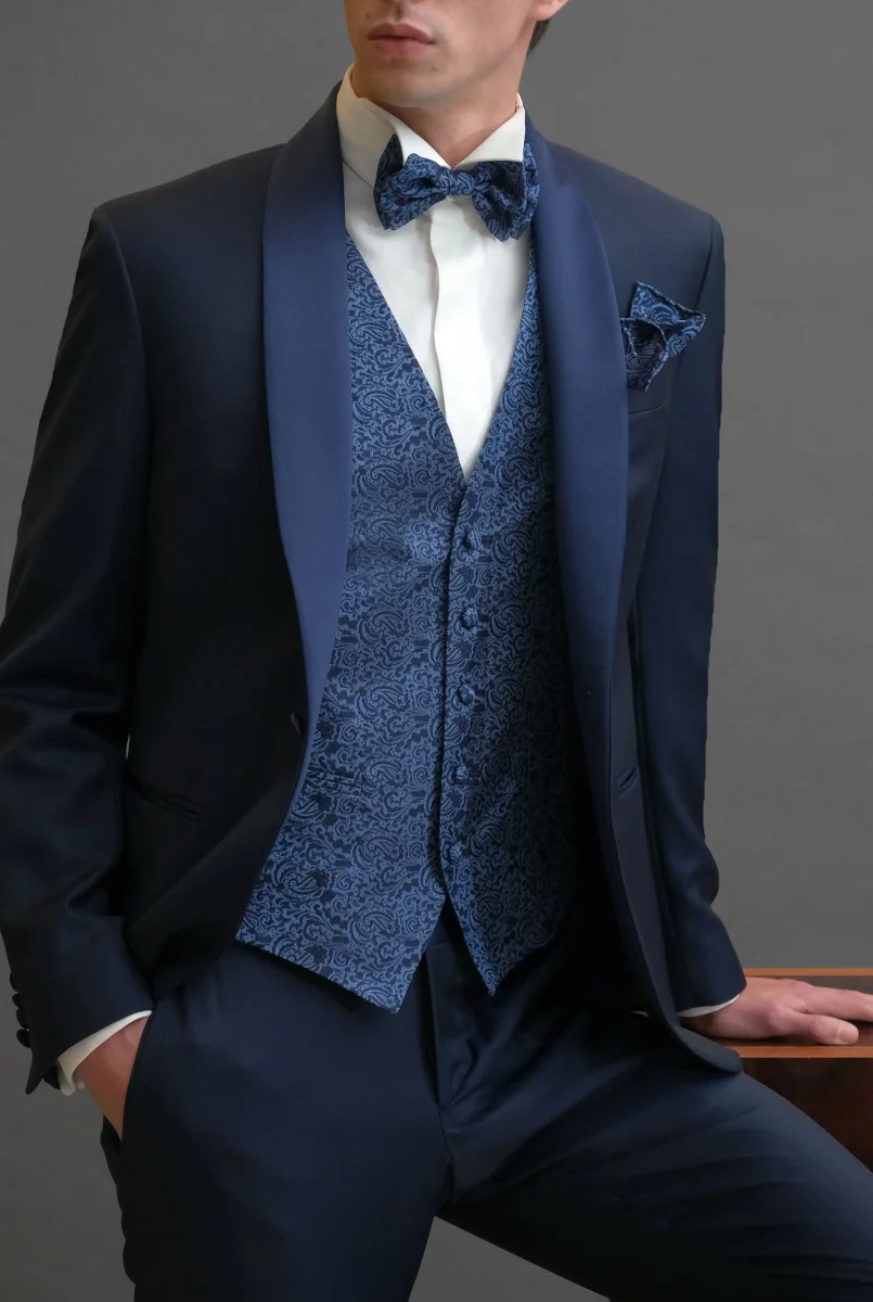 Smoking rever a scialle sablè di lana blu
abbinamento con papillon - immagine 6