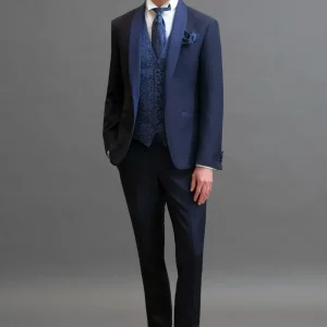 Smoking rever a scialle in sablè di lana blu 
abbinamento con cravatta